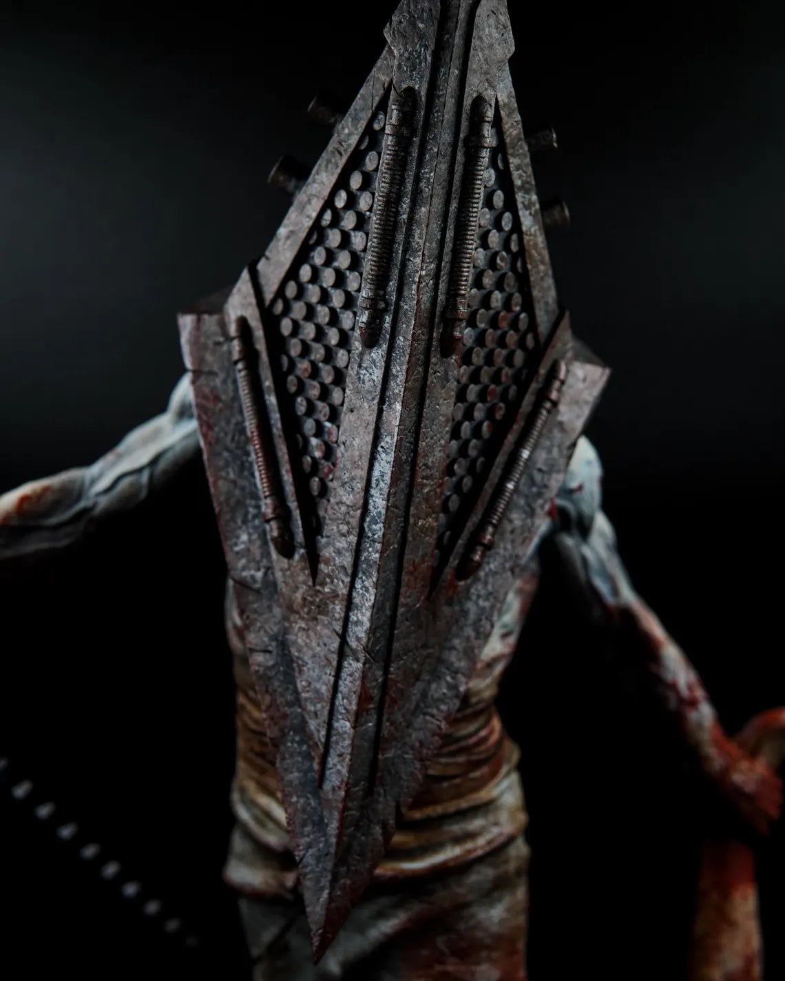 Estátua Colecionador - Cabeça de Pirâmide