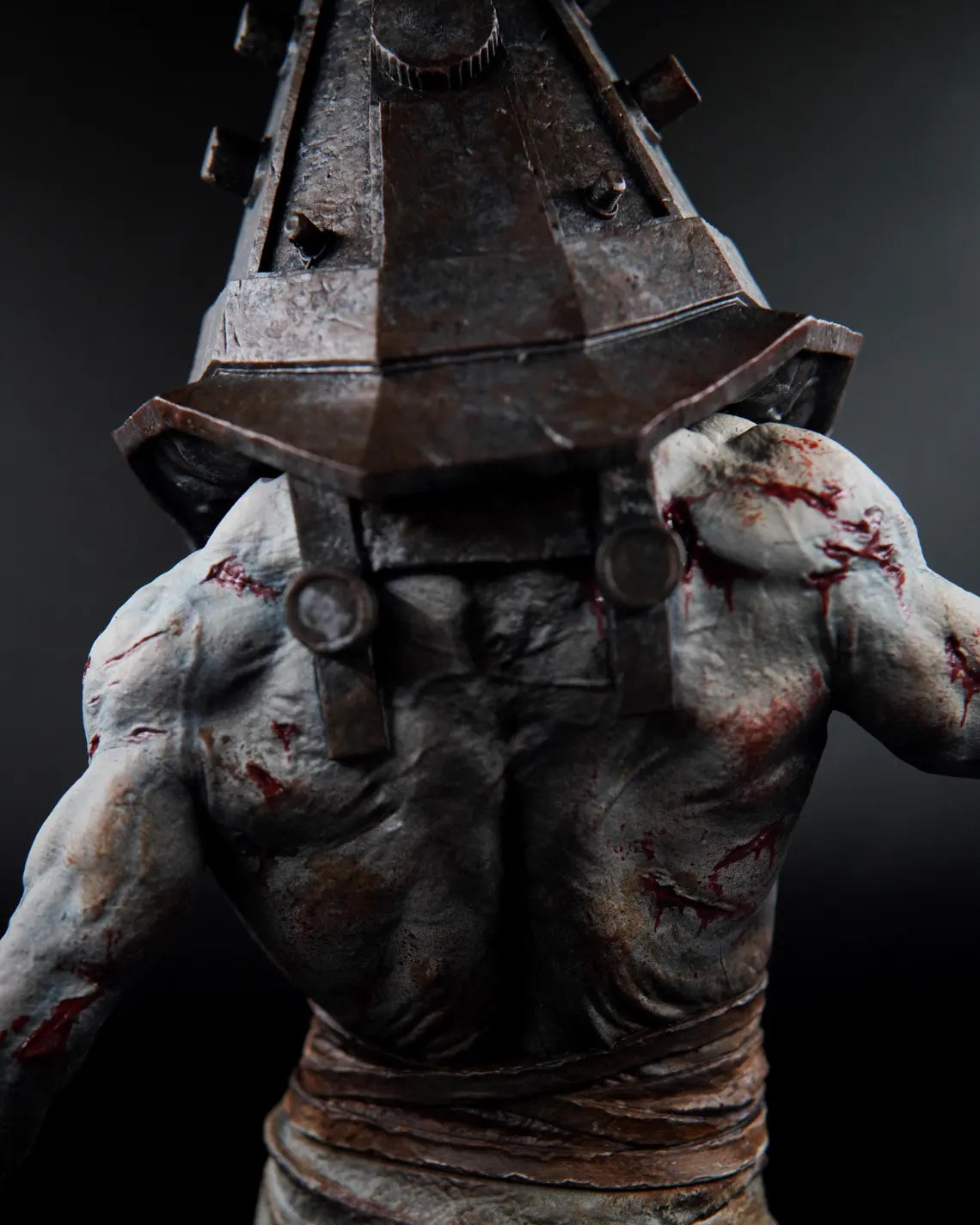 Estátua Colecionador - Cabeça de Pirâmide