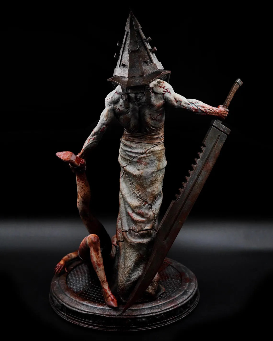 Estátua Colecionador - Cabeça de Pirâmide