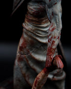 Estátua Colecionador - Cabeça de Pirâmide