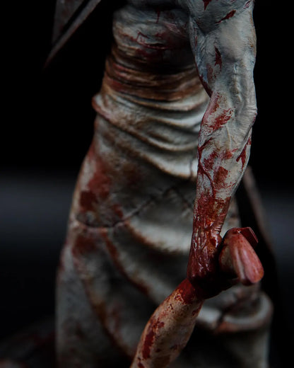 Estátua Colecionador - Cabeça de Pirâmide