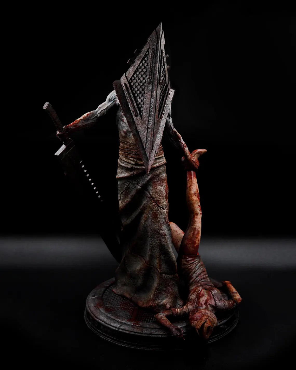 Estátua Colecionador - Cabeça de Pirâmide